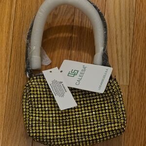 CALE Gold and Black Mini Bag